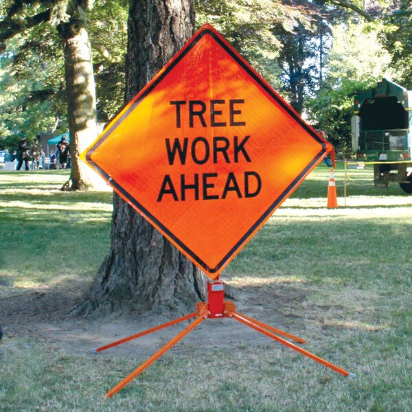 tree work ahead standing sign